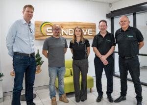 A photo of capral employees and SunDrive Solar together taking a photo recognising their partnership towards sustainability