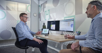 Two people talking about Sustainable Specification